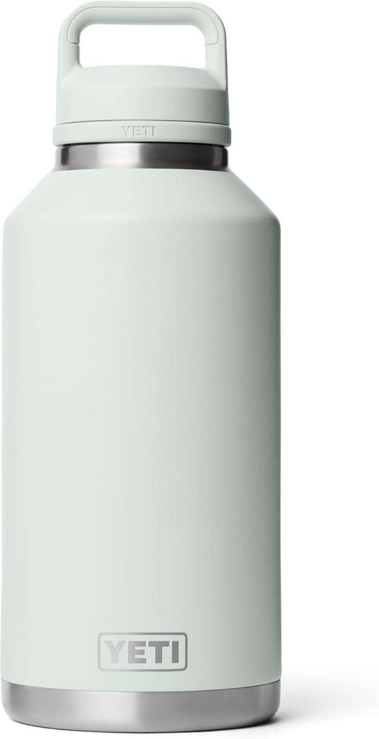 YETI Rambler 64 Oz Bottle in stainless steel, featuring a leakproof chug cap and ridgeline design, perfect for outdoor advent