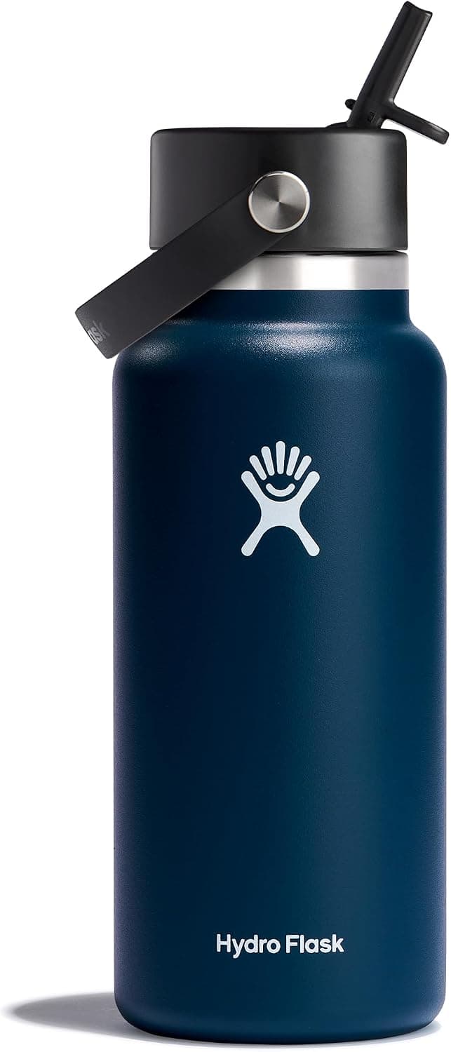 Hydro Flask 32 Oz Water Bottle in Indigo Blue, insulated stainless steel with wide straw lid, non spill and leakproof design.