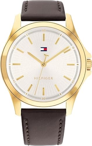 Tommy Hilfiger Men's 3-Hand Quartz Watch with a 42mm case, sleek leather strap, and modern design, perfect gift for him.